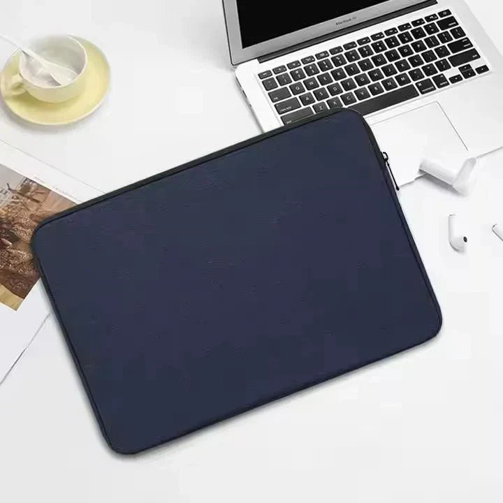 washable paper laptop sleeve in front of laptop