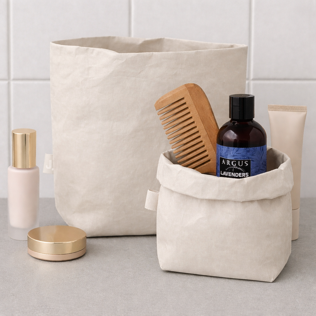 ELSA sustainable cosmetic bag open and half open with toiletry products — washable paper small off-white