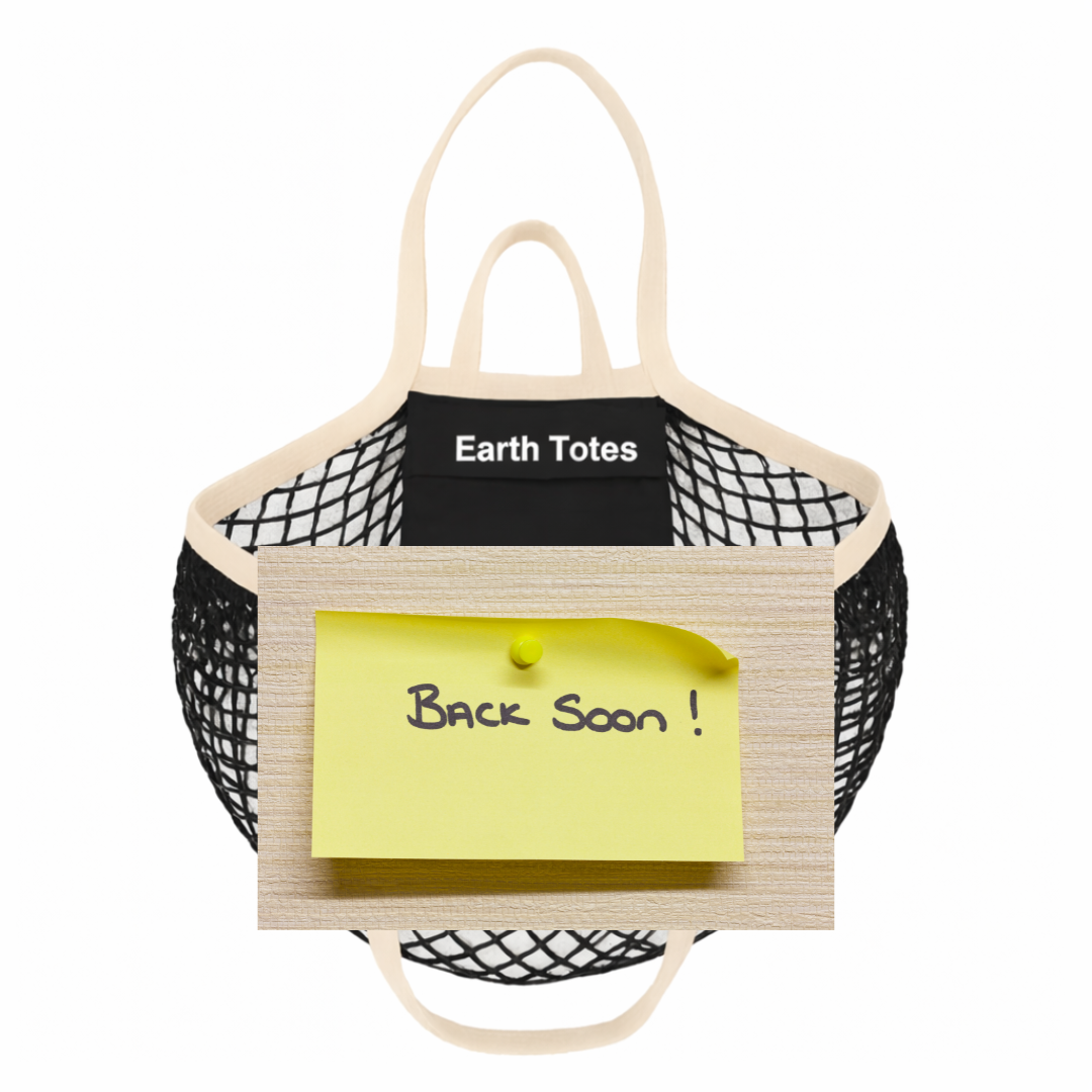 A reusable mesh tote bag with cream handles and trim, shown on a white background. A black label reads 'Earth Totes,' and a wooden board in front holds a yellow sticky note that says 'Back Soon!'.